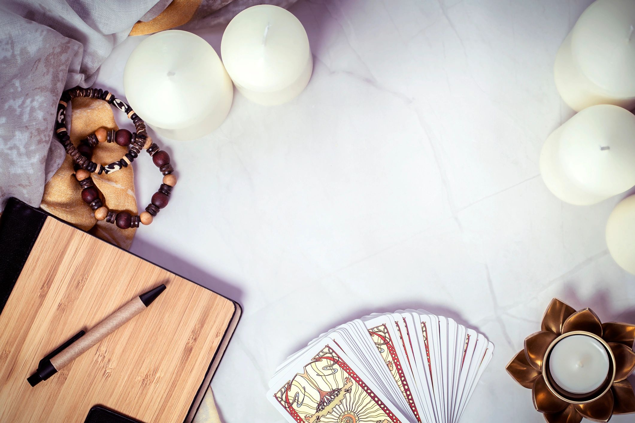 Tarot cards arranged on a wooden study table