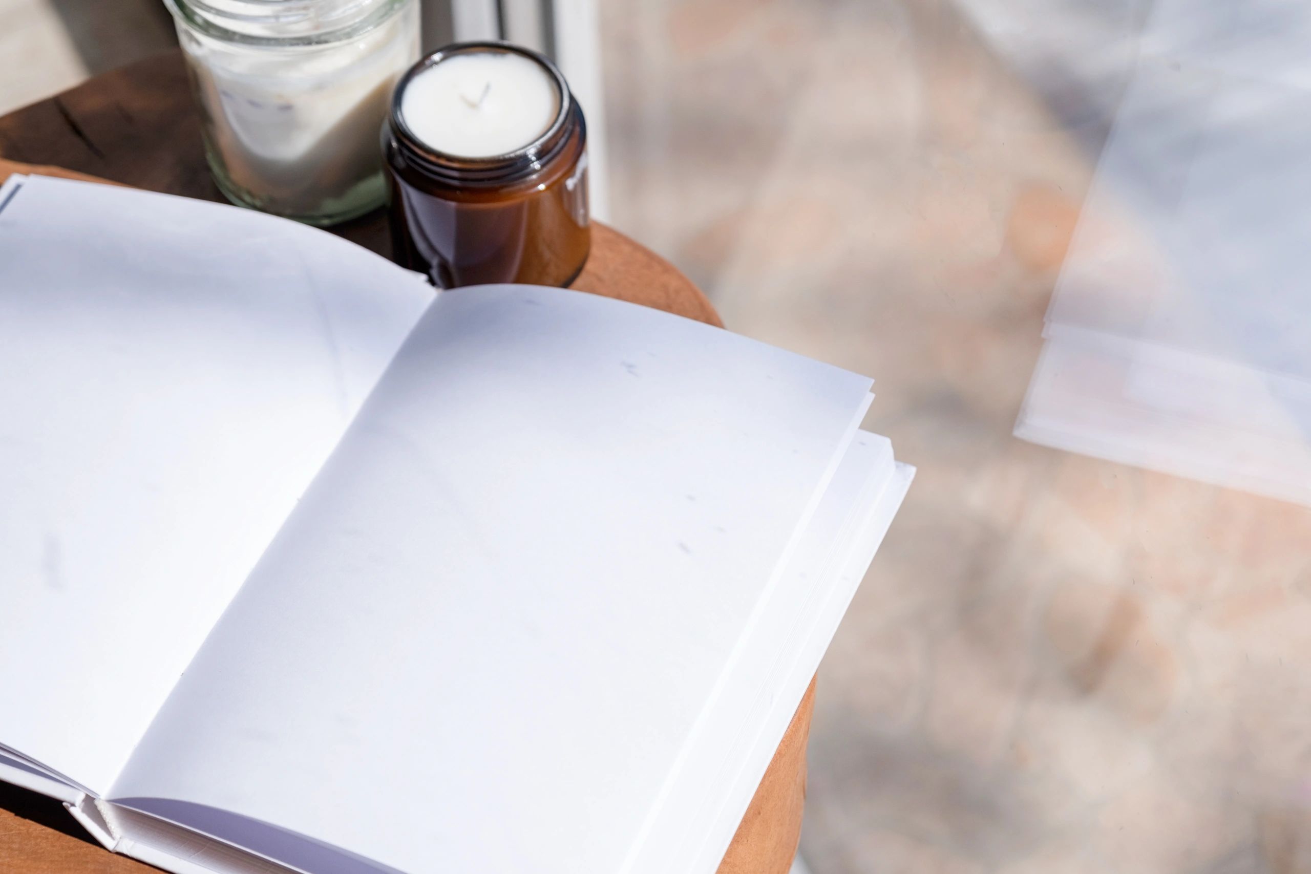Book and candle on a desk suggesting quiet spiritual study