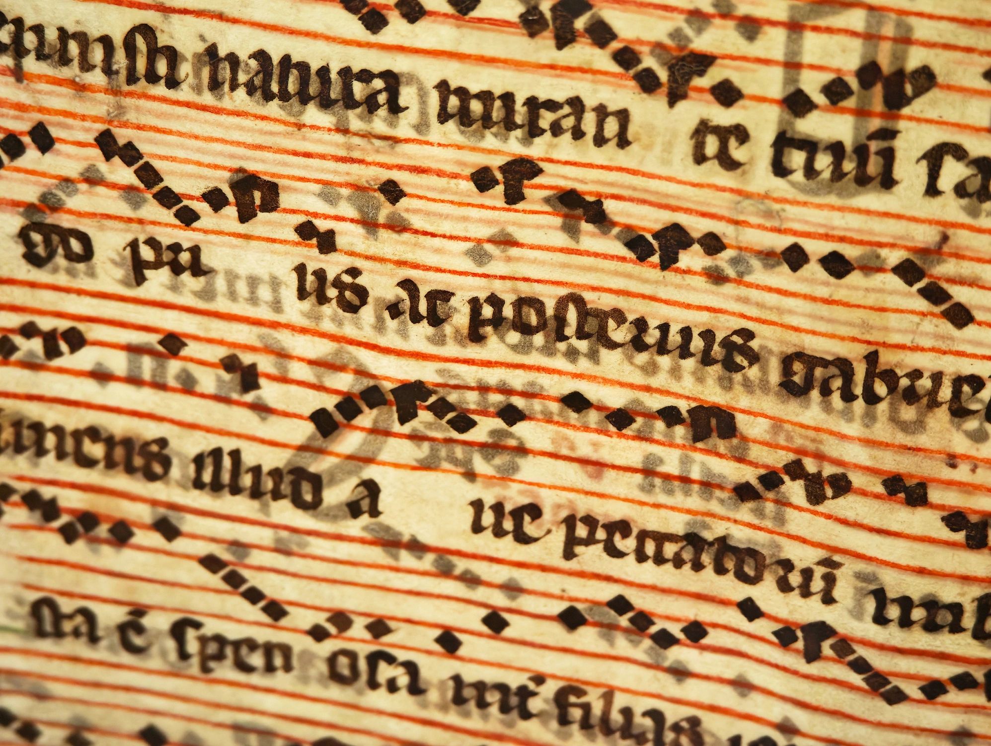 Close-up of an antique manuscript suggesting historical study and symbolism